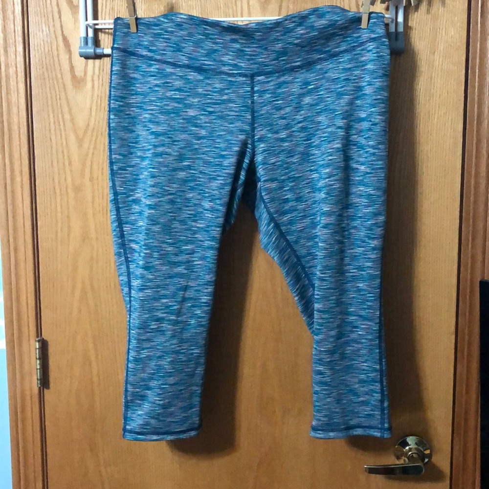 Reversible teal and pink athletic leggings